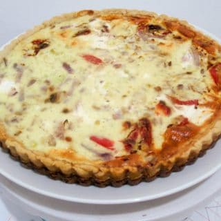 A roasted red peppers and cheese quiche.