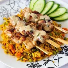 Thai skewers over rice.
