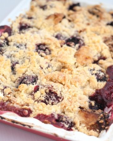 Baking tray with fruit crumbles.
