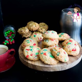 A stack of Christmas cookies on a round board.