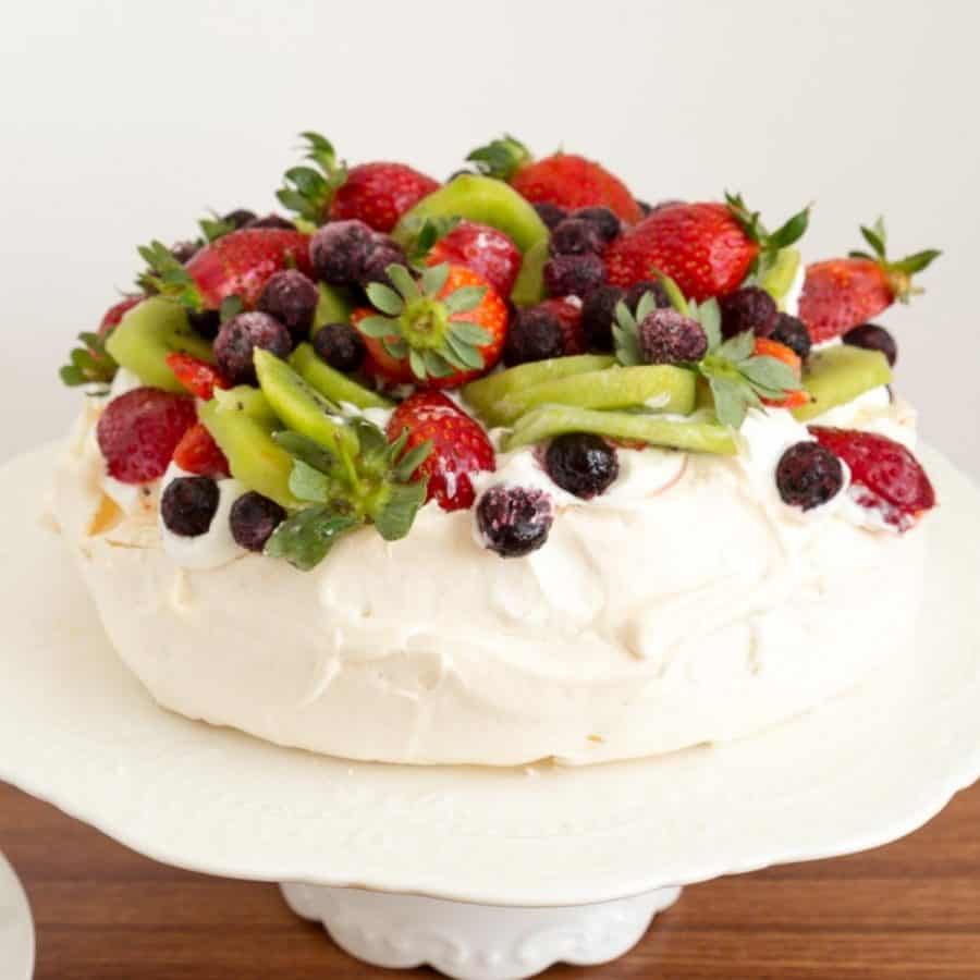 pavlova with whipped cream on the table.