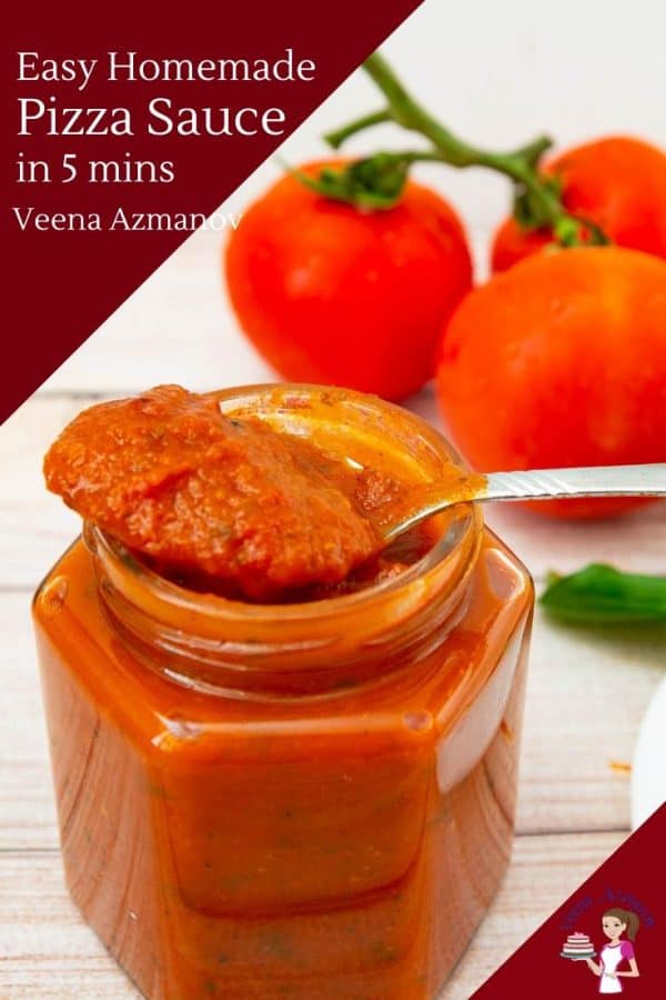 A jar of pizza sauce, with a spoon on top of it.