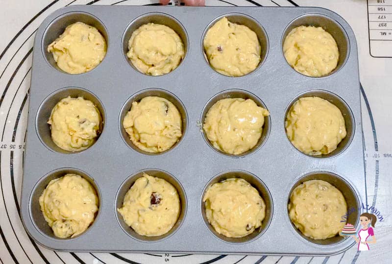 Divide the muffin batter between 12 muffin cups