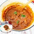 A Dutch oven with braised lamb