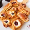 Breakfast pastries on a wooden board.