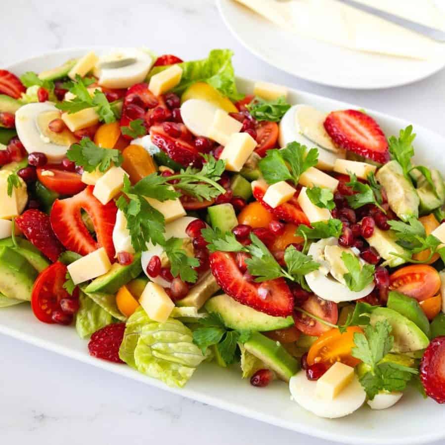 Colorful garden salad on the platter.